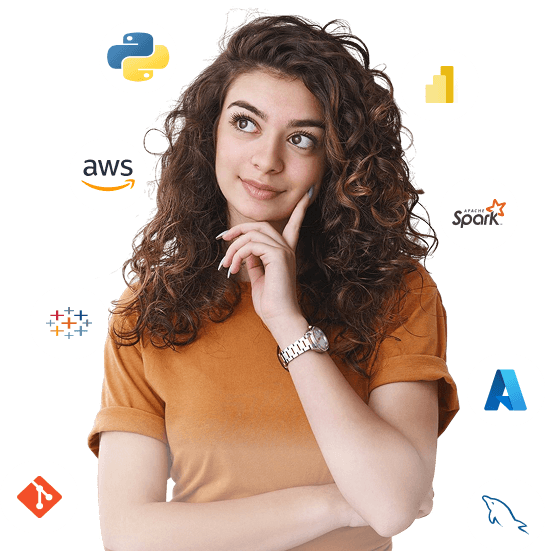 Data analytics students working on real-world projects with laptops and dashboards